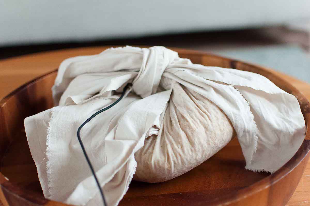 Steamed rice wrapped in a white cloth