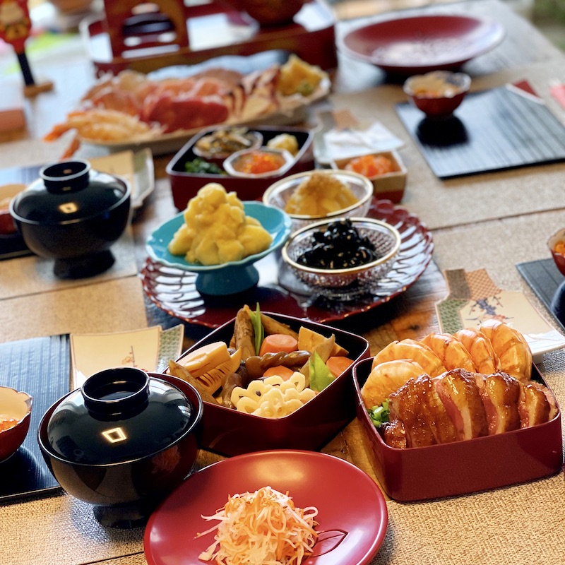 A variety of osechi food on a table