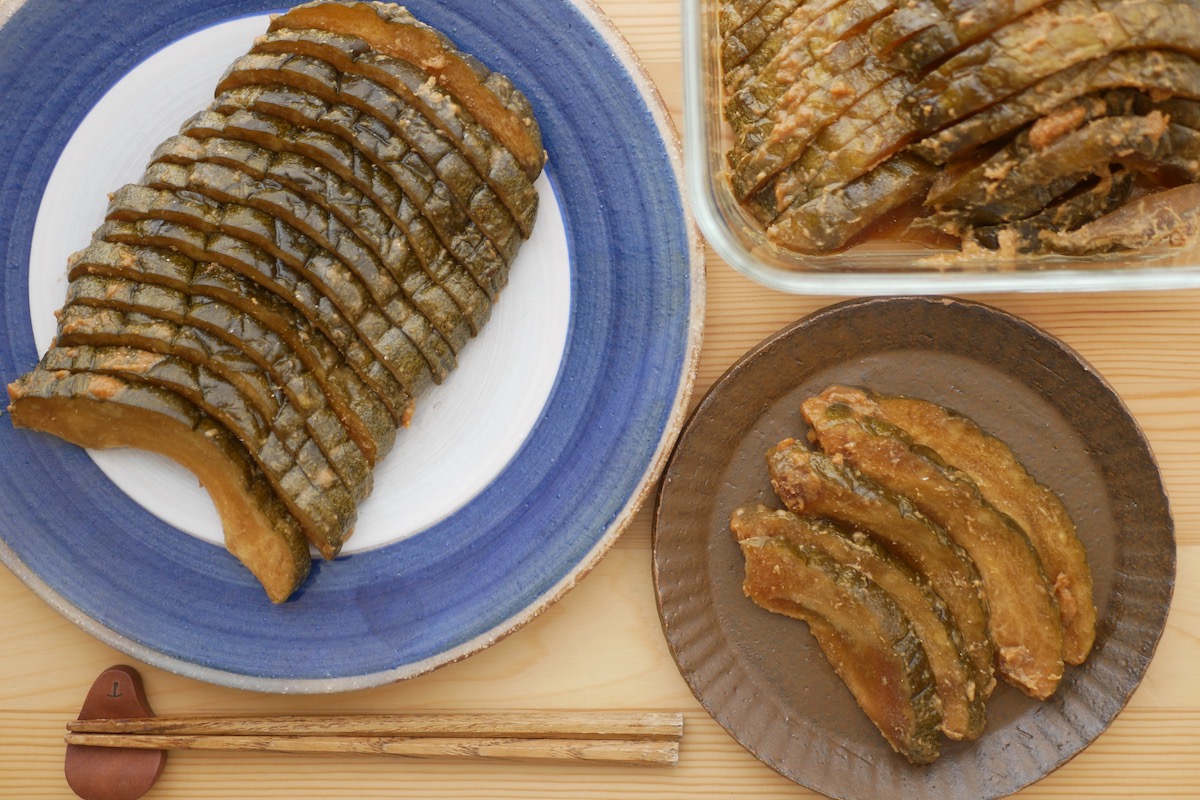 Homemade karimori uri pickles on plates with chopsticks